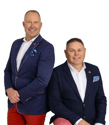 Portrait of Jeremy Grant & Brad Bell, REALTORS®.